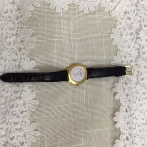 Elegant Gold and Black Women's Watch